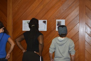Staff and youth enjoy the gallery of photos and writings.