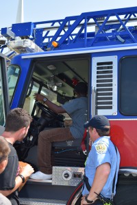 One of our Children's Home residents sitting in the driver's seat of the big fire truck!