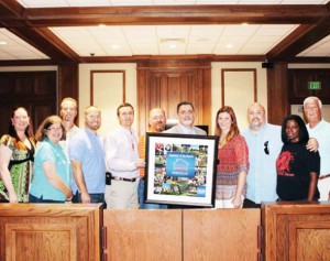 From left are Kristi Lumpkin; Rev. Edith DeVilbiss, Chaplain; Dr. David Wheeler, VP of Clinical Services; Ryan Forbes, Clinical Program Manager; Luke Allen - VP of Operations; Phillip McMillan, Director of Admissions; Rick Wheat, President and CEO; Morgan Davis, Admissions Coordinator; Andrew Morse, Clinical Program Manager; Santye McWain, Mental Health Supervisor; and Mayor Ronny Walker