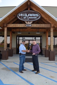 Ben Malone, owner of Malone Polaris, is pictured with Danny Bell at Malone Polaris in Ruston.